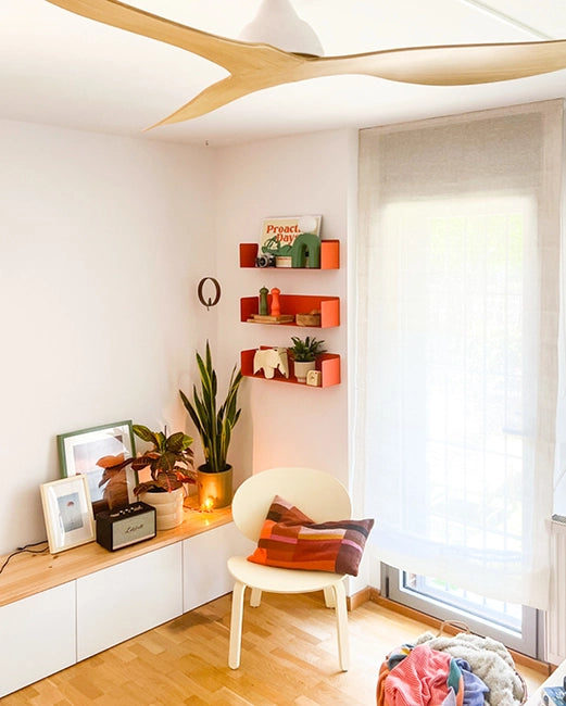 Terracotta-colored floating wall shelves, sturdy metal, colorful design for books, decor, and kitchen